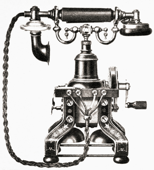 A 1900 Magneto telephone, featuring an integrated magneto driven by the handle on the right, from  The Pageant of the Century, pub. 1934