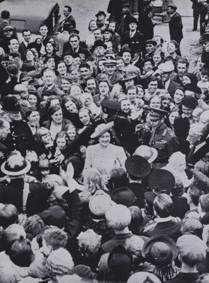 King George VI and Queen Elizabeth visiting the people of Bermondsey, a borough of London that was much bombed during World War II, 1941 (b/w photo)