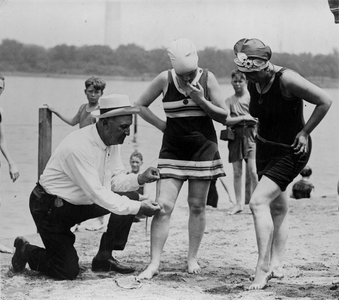 Enforcement of the bathing suit law, 1922 (b/w photo)