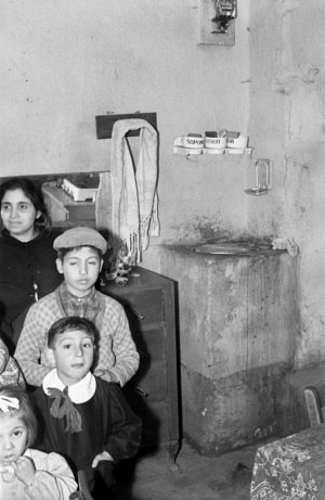 CROTONE - LIVING IN A CROWDED BASEMENT, , 1957 (photo)