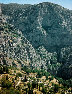 Delphi, overall view from the way to the stadium: the two Phaedriad mountains, Rodini and Flemboukos, Temple of Apollo (photo)
