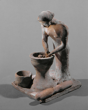 Baker woman kneading dough …