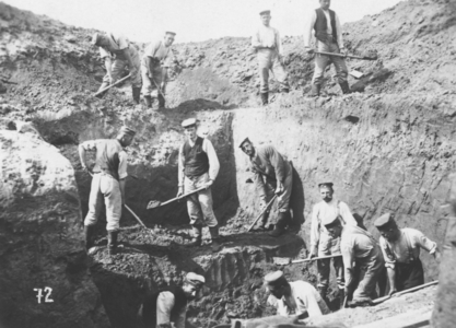 Austro-Hungarians digging a trench, 1916 (b/w photo)