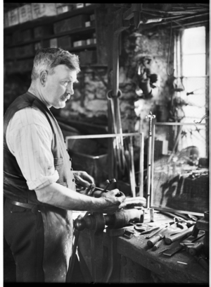 Mr Jefferies at work in Southrop Forge, The Forge, Southrop, Cotswold, Gloucestershire, UK,  (photo)