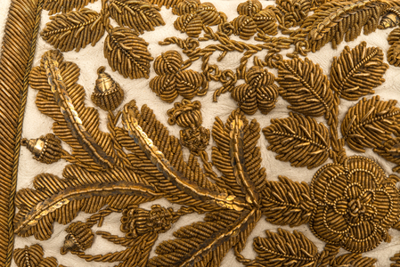 Detail of the right hand glove used at the Coronation of Queen Elizabeth II in 1953 (embroidered white kid leather)
