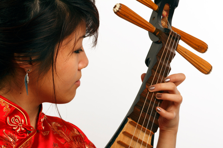 Chinese girl playing a Chinese Pipa
