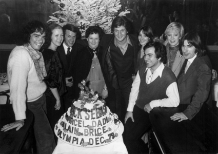 Premiere of Patrick Sebastien at The Olympia, Paris, December 20, 1979 Around The Cake : Nicolas Peyrac, Marie Dubois, Salvatore Adamo, Patrick Sebastien Between his Mother and his Fiancee, Marcel Dadi, Alice Dona and Serge Lama (b/w photo)