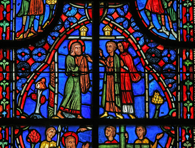 Window w11 depicting St Andrew gives away his clothes (stained glass)