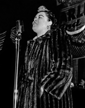 Billie Holiday at Golden Gate Balroom in Harlem, New York City, in 1939 (b/w photo)