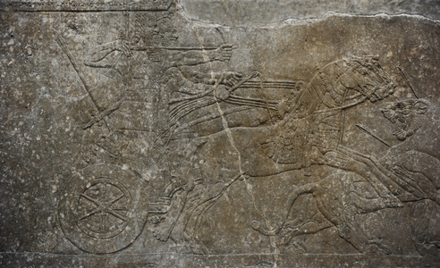 Mesopotamian art. Assyrian. Relief of the palace of Ashurnasirpal II or Northwest Palace at Nimrud. Alabaster. Dated 883-859 B.C. It depicts the lion hunt. Pergamon Museum. Berlin. Germany.