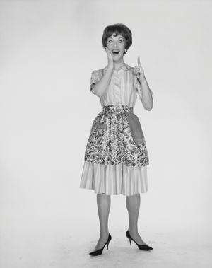 Portrait of a young woman looking surprised