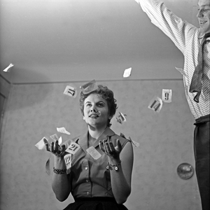 German singer and actress at a promo shooting at her flat, Germany 1950s