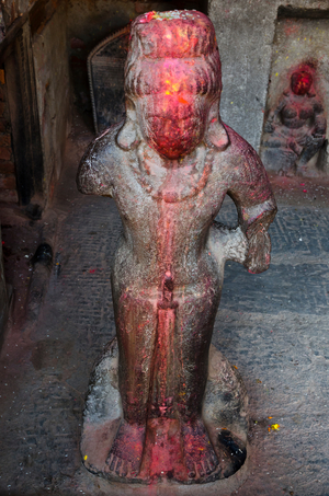 Armless, standing Shiva statue (4th century) in Ganesh Temple, 
Kirtipur, Kathmandu Valley, Nepal (photo)