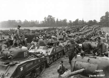 A large group of Sherman tanks of the 2nd French Armored Division which had landed at Saint Martin de Varreville, Normandy, France, August 1944 (b/w photo)