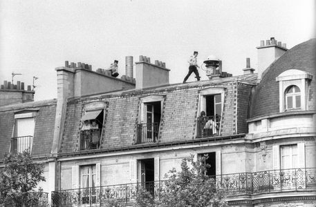 July 14: policeman on the roofs, Paris, 1974 (b/w photo)