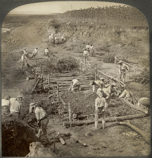Japanese building a bridge of poles across a stream for the passage of troops in Manchuria, Single Image of Stereo Card, Underwood & Underwood, 1906 (b/w photo)