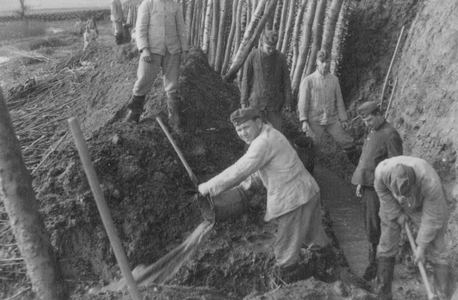 Soldiers Digging Into a Stream, 1942 (b/w photo)