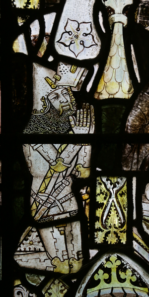 A kneeling knght (stained glass)