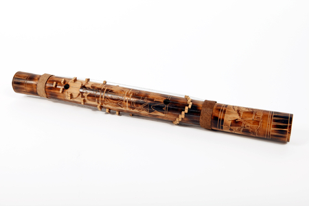 A Valiha, Bamboo Zither or tube harp from Africa. Made from a short section of bamboo with metal strings running top to bottom around the whole of the tube, stretched over small moveable bridges. From Madagascar, Mauritius and Africa - gen
