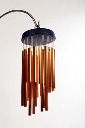 set of graded  brass tubes as a set of wind chimes, (photo)