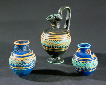Three core-made juglets (glass)