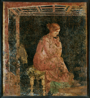 A sitting woman from Pompeii, Italy (mural)