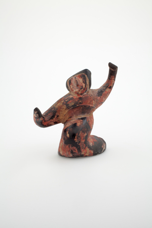 Kneeling figure (grey earthenware with red & black painted decoration)