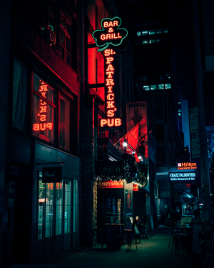 St. Patricks's Pub neon sign at night in Midtown Manhattan, New York City, United States, 2025 (photo)