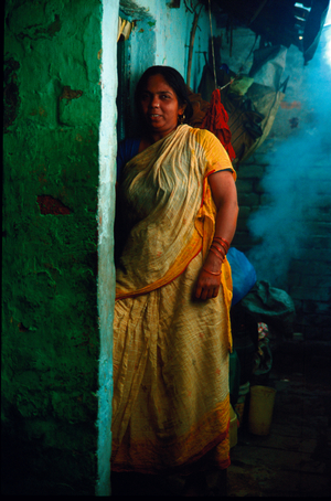 Slums, with smoke from coal cooking, Kolkata, India, 2007 (photo)