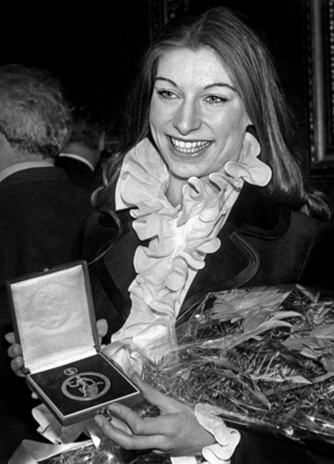Austrian Figure Skater Claudia Kristofics-Binder At A Reception At The Hotel De Ville De Viennes With Her European Champion Medal On February 24, 1982 (b/w photo)