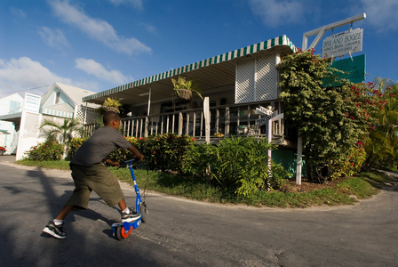 Child in a skate and loyalist home, Bahamas (photo)