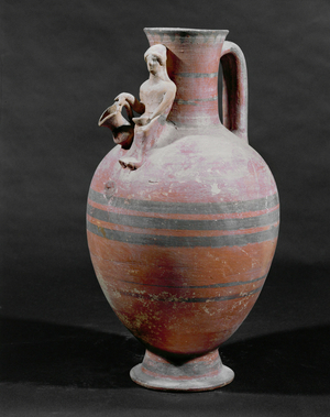 Woman pouring a libation …