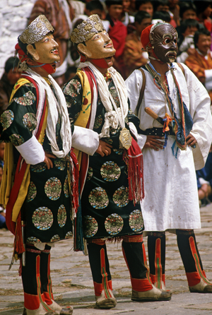 Mask dancers at the Paro Tshechu, mask dance festival, in the Paro Dzong, Bhutan (photo)