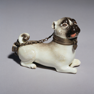 A Meissen pipe-bowl modelled as a seated pug-dog, c.1745 (porcelain)