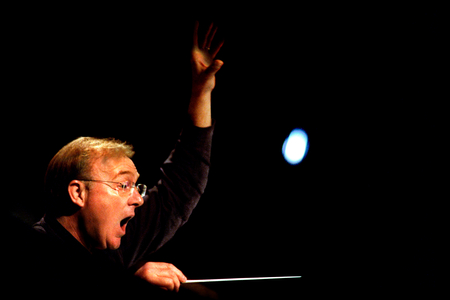 Martyn Brabbins conducting The Pilgrim's Progress