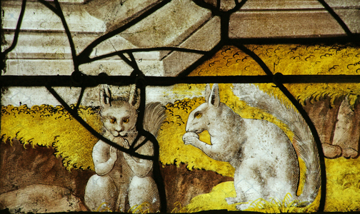 Window depicting squirrels at the base of the window with Emperor AuguSaintus' vision (stained glass)