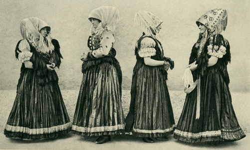 Hungary. Young dames in typical dresses of Mezökövesd with bizarres headdresses. 1920