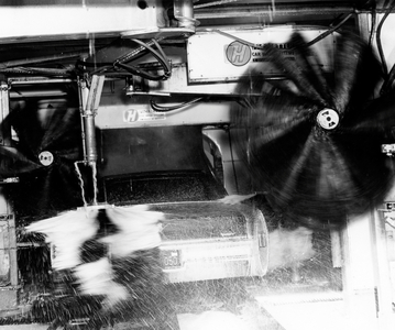 High angle view of a car wash at a gas station (b/w photo)