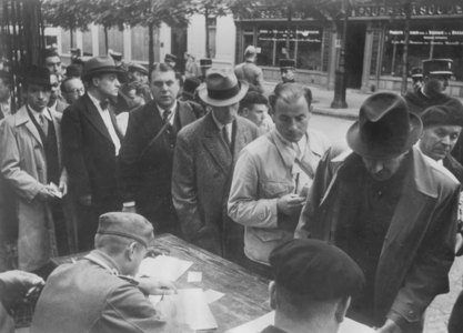 Checking of Jews in occupied France, 1941 (b/w photo)