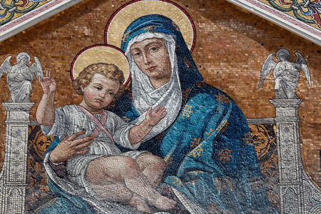 Mosaic of Virgin Mary and Child on the facade of Saint Spyridon Orthodox Church. Trieste. Italy.