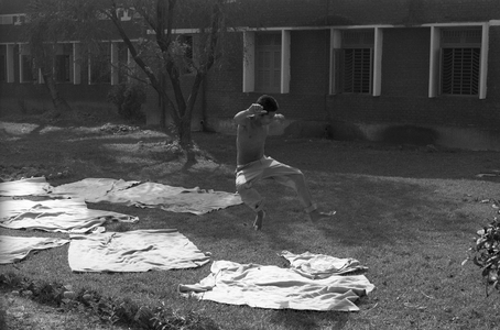 Patients are hyperactive in the morning and often sing and dance. Mental Hospital, Pabna, in Bangladesh. 1994. The Mental Hospital, Pabna is the first hospital of its kind in Bangladesh for a population of about 130 million. It was established in 1957 by the then Civil Surgeon of Pabna District in a local landlord's house. In 1959 it was shifted to Hemayetpur, about 8 km from the district town. Initially the number of beds was 60 and subsequently was increased to 500. According to National Mental Health Survey in 2003-2005 about 16.05% of the adult population in the country is suffering from mental disorders. There are about 700 beds in the government hospitals for mental patients, which is very insufficient for a large number of people suffering from mental illness.  (photo)