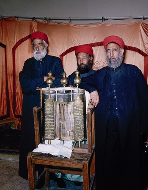 Nablus Jordan, Samaritan priests stand by a vellum scroll of the five books of Moses, which dates to the middle ages, Nablus is now in West Bank of Israel aka Palestine, 1966 (photo)
