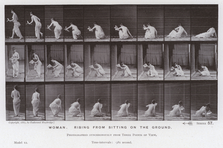 The Human Figure in Motion: Woman, rising from sitting on the ground (b/w photo)
