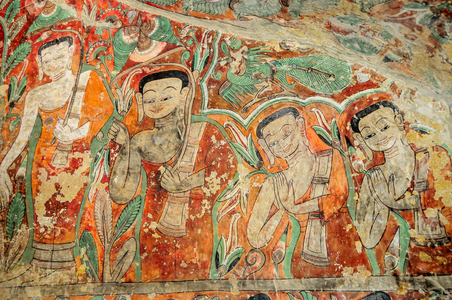 Fading murals in the caves at Po Win Taung, Myanmar