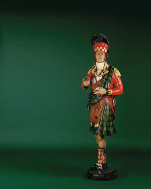 'Sandy', a Victorian tobacconist's shop sign (polychrome wood with iron bound base)