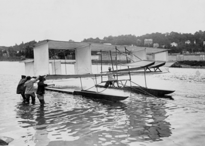 Glider of French pilot and manufacturers the brothers Gabriel and Charles Voisin over the river Seine, june 1905