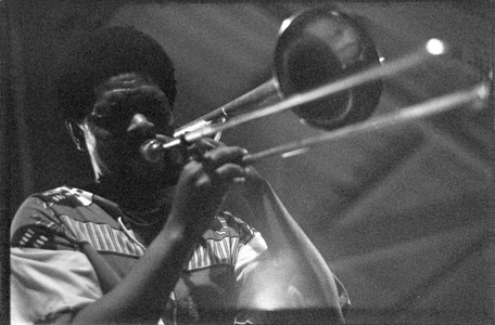 Black and white photo of Willie Nettie playing the trombone at Langa Town Hall, Langa, Cape Town, 1972 (photo)