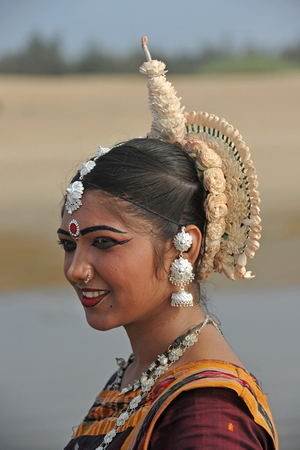 A dancer from Guru Gangadhar Pradhan's Konark Natya Mandap at the Konark beach, during the annual Konark Dance and Music Festival, held from February 19th and 23rd, 2010 at Konark in Orissa, India. February 22, 2010. .  (photo)