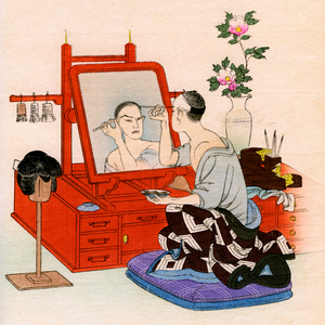 Traditional Japanese theater: an actor performs makeup in his dressing room, 1900 (illustration)