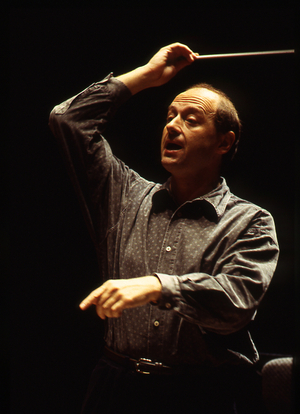 Ivan Fisher - portrait of the Hungarian conductor conducting, 1988. b. 1951.